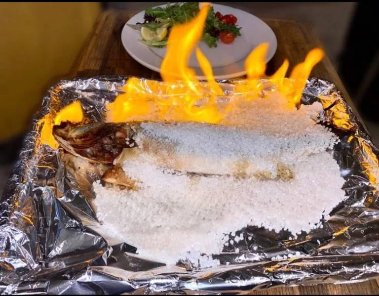 Branzino al Sale at the table