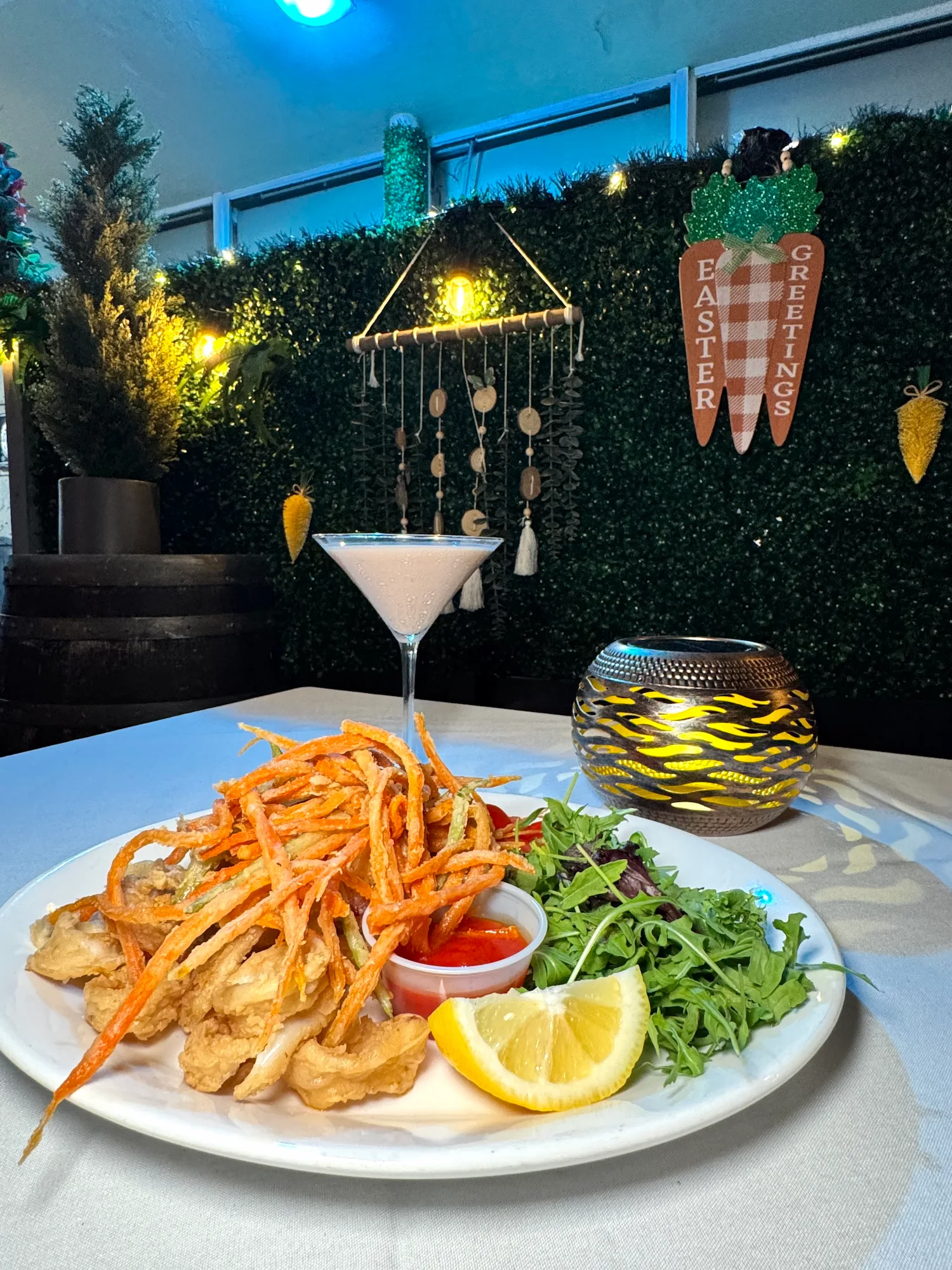 Fresh Italian prawns served with greens and lemon at Le Sorelle